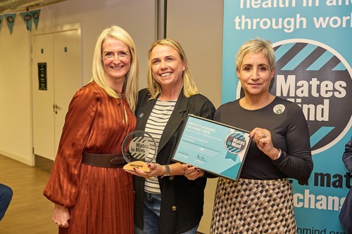 Seddon receiving the 2025 Impact through Supply Chain award from Michelle Wiles, Patron of Mates in Mind